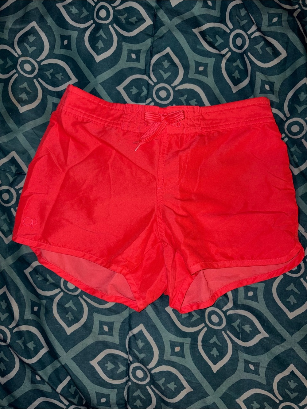 Ocean Pacific Girls board shorts.